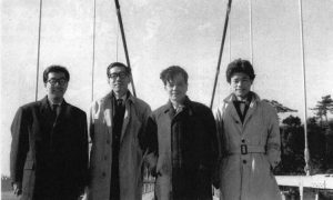 Black and white photo of a group of young Japanese architects