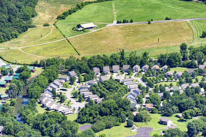 freen field in england, showing green fields and houses